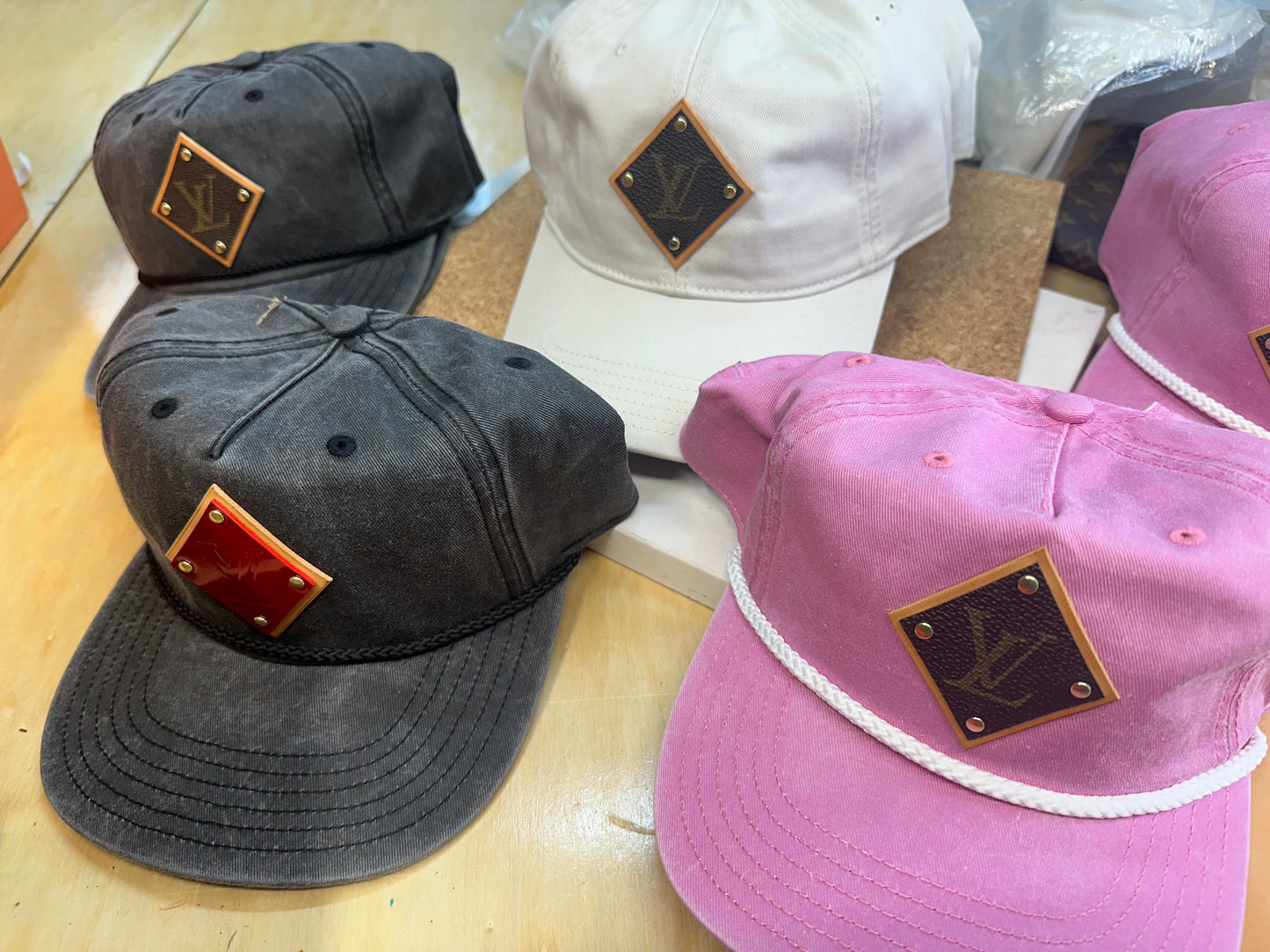 Hats with leather and diamond lv