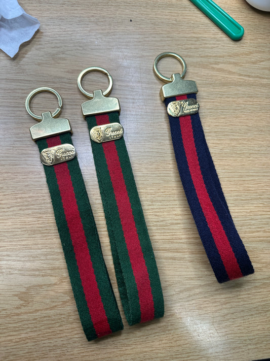 Gucci webbing wristlet