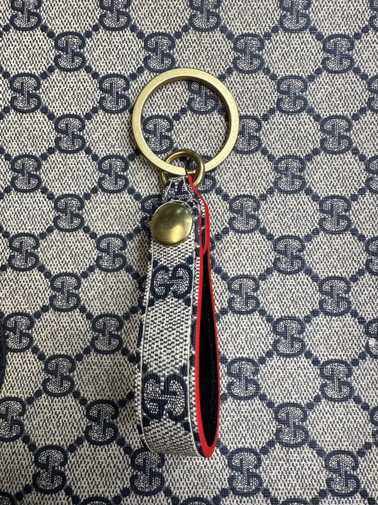 Upcycled blue monogram snap keychain